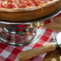 Does chicago style pizza have sauce on top?