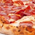 What style of pizza is thick crust?