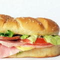 What is the Origin of the Name 'Grinder' for a Sub Sandwich?